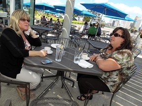 Vivian Ryan, left, and Pauline White enjoy a lunch break at the Bistro in Windsor on Wednesday, July 11, 2012. (The Windsor Star / TYLER BROWNBRIDGE)