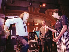 Garth Hudson of The Band chats with then-tourism minister Anne Swarbrick at the Capitol Theatre in Windsor, Ont. in July 1993, as then-mayor Mike Hurst and local blues fan Dino Casagrande look on. Hudson was born in Windsor. (The Windsor Star /Ted Rhodes)