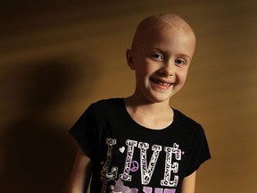 Maya Hulme is photographed in her Belle River home on Friday, August 10, 2012. Hulme returned from three months in London where she under went surgery and radiation treatment for a brain tumour. The family was overwhelmed by the support they have received.  (The Windsor Star / TYLER BROWNBRIDGE)