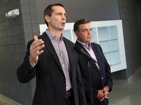 McGuinty and Duncan answer questions about the provincial government's dispute with Ontario teachers. (Tyler Brownbridge / The Windsor Star)