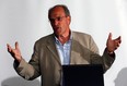 Peter Knowles, former CEO of the 2008 FINA swimming championship in Manchester, England, gestures while speaking at a special city council meeting in Windsor, Ont. on Aug. 28, 2012. (Nick Brancaccio / The Windsor Star)