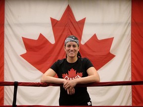 Boxer Mary Spencer takes part in a press conference at the Windsor Amateur Boxing Club in Windsor on Monday, June 18, 2012. Spencer will box for Canada at the Olympics in London. (The Windsor Star / TYLER BROWNBRIDGE)