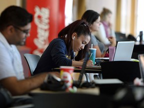 Students study at the CAW Centre at the University of Windsor in this April 2012 file photo. A recent study shows that people with a lower level of education tend to have higher rates of disease and death. (TYLER BROWNBRIDGE/The Windsor Star)