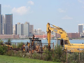 Heavy equipment on the fenced riverfront property owned by Hiram Walker & Sons in Windsor, Ont. Photographed Aug. 15, 2012. (Tyler Brownbridge / The Windsor Star)