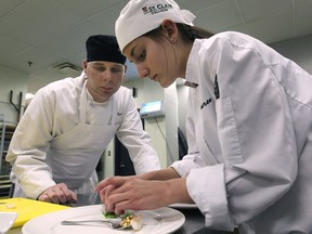 Student chefs Ryan Shields, left, Lauren Luxford ain the St. Clair College culinary program, prepare  appetizers in a fundraising event on April 4, 2012.  (DAN JANISSE/The Windsor Star)