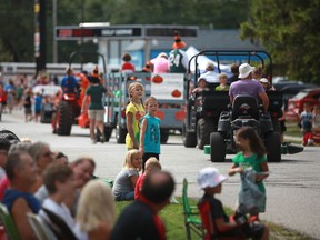Hundreds of people lined the streets of downtown Harrow Saturday for the parade to kick off the 158th Harrow Fair. (Dax Melmer/The Windsor Star)