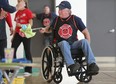 Dave Ethier, of Windsor Fire and Rescue, participates in the 6th annual Canadian Paraplegic Association Ontario, Wheelchair Relay Challenge at Michel-Gratton high school, Saturday, Sept. 29, 2012.  (DAX MELMER/The Windsor Star)