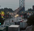 File photo of  tractor-trailers lined up at the Ambassador Bridge on Huron Church Road  July 16, 2012.  (NICK BRANCACCIO/The Windsor Star)