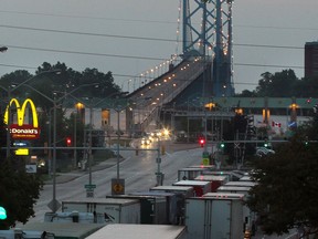 File photo of  tractor-trailers lined up at the Ambassador Bridge on Huron Church Road  July 16, 2012.  (NICK BRANCACCIO/The Windsor Star)