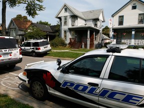 Rooming house at 386 Bruce Avenue where a man by the name of Ray was found dead, September 17, 2012. Windsor Police investigators were inside in a second-floor unit. (NICK BRANCACCIO/The Windsor Star)