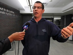 In this 2012 file photo, Brian Hogan, president of the Ontario English Catholic Teachers Association local Windsor/Essex secondary level speaks to the media at the Windsor-Essex Catholic District School Board meeting.