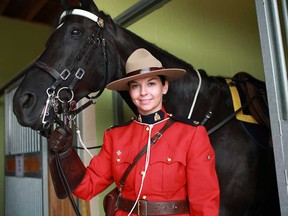 Leamington native, Const. Sarah Brophey, is pictured before performing with the RCMP Musical Ride at the Windsor Essex Therapeutic Riding Association in McGregor, Ont., Sunday, Sept. 2, 2012.  (DAX MELMER/The Windsor Star)