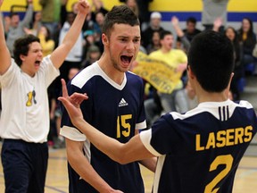 St. Joseph's Cameron Anger, centre, Andre Ghita, left, and Eddie Simmalavong celebrate after beating Sandwich in the 2011 final. (NICK BRANCACCIO/The Windsor Star)