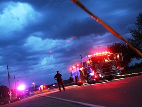 In this file photo, OPP officers investigate an impaired driving collision on County Road 2 near Stoney Point on May 3, 2012. Cindy Van Parys was transported to hospital with life-threatening injuries and later died. (TYLER BROWNBRIDGE / The Windsor Star)