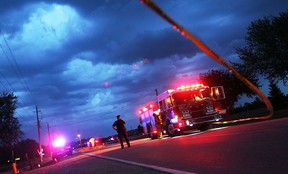 In this file photo, OPP officers investigate an impaired driving collision on County Road 2 near Stoney Point on May 3, 2012. Cindy Van Parys was transported to hospital with life-threatening injuries and later died. (TYLER BROWNBRIDGE / The Windsor Star)