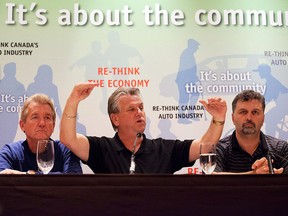 CAW National President Ken Lewenza speaks at a Canadian Auto Workers' press conference to announce the union has reached a tentative agreement with Chrysler in Toronto in this September 2012 file photo. (THE CANADIAN PRESS/Michelle Siu)