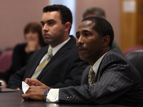 General manager Chris Mendas (left) and president and CEO Dartis Willis from the Windsor Express basketball team speak during a regular meeting at city hall in Windsor on Tuesday, September 4, 2012. (TYLER BROWNBRIDGE/The Windsor Star)