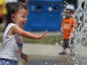 File photo: Xander Balteiro, 1, has a blast while cooling off at the splash pad at Austin Toddy Jones Park on July 29, 2012.(DAX MELMER/The Windsor Star)