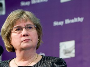 Chief Medical Officer of Health, Dr. Arlene King listens to a question from the media during a press conference in this 2009 file photo. (Aaron Lynett / National Post)