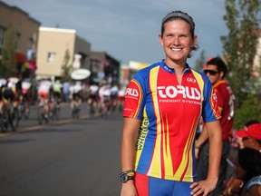 WINDSOR, ONT: Chantal Thompson watches the men's division compete after finishing sixth in the womens at the 53rd Tour di Via Italia cycling race on Erie Street Sunday, Sept. 2, 2012. (THE WINDSOR STAR/ Kristie Pearce)