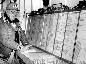 Dec.17/1985-Walter Pastorious completes his liquor order form for the last time at the Wheatley LCBO outlet. (The Windsor Star-Rob Hornberger)