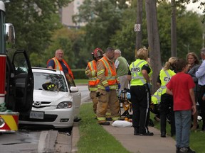 WINDSOR, ONT.:SEPTEMBER 8, 2012 -- Two people have minor injuries after a motor vehicle accident between a Mazda 3 and a Ford F-150 on Riverside Drive East, just east of Strabane Avenue, Saturday, Sept. 8, 2012.  (DAX MELMER/The Windsor Star)