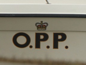 The OPP logo on the site of a provincial police boat is seen in this March 2012 file photo. (Dax Melmer / The Windsor Star)