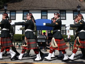 The Essex and Kent Scottish Regiment march down Sandwich Street at the conclusion of a dedication ceremony for the Olde Sandwich Towne Heritage Peace Garden at the corner of Sandwich Street and Detroit Street, Saturday, Sept. 8, 2012. (DAX MELMER/The Windsor Star)
