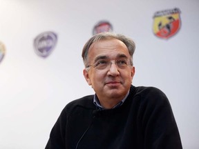 Sergio Marchionne, chief executive officer of Fiat SpA and Chrysler Group LLC, pauses during a media briefing on the first day of the Paris Motor Show on Sept. 27, 2012.  (Jason Alden/Bloomberg)