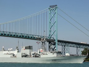 The Canadian HMCS Ville de Quebec ship navigates along the Detroit River Tuesday, Aug. 7, 2012, near Windsor, Ont. near the Ambassador Bridge. The ship departed Halifax, N.S. in July for a ten week tour of 14 Canadian and American cities along the St. Lawrence Seaway and the Great Lakes. The ship will be docked in Windsor from September 5-10. It was on Tuesday for Milwaukee, Wisconsin. (DAN JANISSE/The Windsor Star)