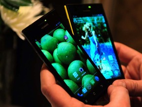 Smartphones on display at the annual Consumer Electronics Show in Las Vegas on Jan.9, 2012. (FREDERIC J. BROWN/AFP/Getty Images)