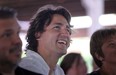 MP Justin Trudeau has a laugh while listening to MPP Dwight Duncan speak while at the Windsor-Essex Liberal BBQ at the Ciociaro Club, Saturday, Sept. 8, 2012. (DAX MELMER/The Windsor Star)