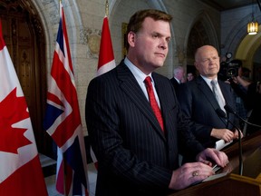 Minister of Foreign Affairs John Baird and Britain's Foreign Secretary William Hague agree to share embassy space abroad. THE CANADIAN PRESS/Sean Kilpatrick