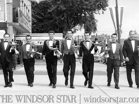 July 4 1961-Waiters wait for the start of the bubbly runoff, part of the International Freedom Festival. Left to right: Ivan Fenkanyn of the Norton Palmer, Emil Bertoia of the Elmwood Casino, Eric Langlois of the Killarney, Vic Fowes of the Elmwood: Jerry St. Denis of the Killarney, Joe Wayne of the Elmwood Casino,and Lloyd Kelly of the Prince Edward. (The Windsor Star-FILE)