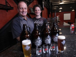 Co-owner Chris Ryan, left, and brew master Nick Poloski show off their wares at Walkerville Brewery on Argyle Road.