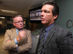 Windsor Star Publisher and Editor-in-Chief Marty Beneteau, right, and Director of Advertising Ken Stewart attend a meeting on Oct. 1, 2012, where council approved an amendment to a bylaw allowing two, large LED screens to be installed on the renovated Star building. (NICK BRANCACCIO/The Windsor Star)