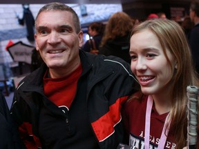 Rick Cipolla, left, and his daughter, Catherine Cipolla, 14, from Ancaster, attend the Hocktoberfest Girls Hockey Tournament at the WFCU Centre, Saturday, Oct. 20, 2012. (DAX MELMER/The Windsor Star)