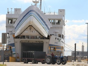 The M.V. Jiimaan unloads at the Leamington dock Friday, Oct. 12, 2012. The ferry spent 24 hours stuck on a sandbar near the Kingsville Harbour. It will remain docked until at least Monday pending tests. (DAN JANISSE/ The Windsor Star)