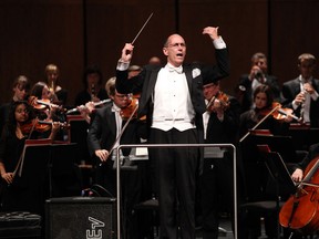 Kevin Rhodes conducts the Windsor Symphony Orchestra at the Capitol Theatre Saturday, Oct. 13 in Windsor. (KRISTIE PEARCE/ The Windsor Star)