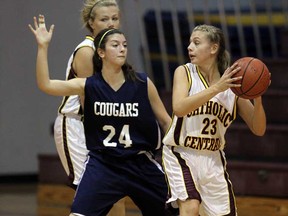 Cardinal Carter's  Aleesia Zonta, left, guards Catholic Central's Sam Brosseauin WECSSAA girls basketball action Tuesday October 2, 2012. The Comets won 45-27. (NICK BRANCACCIO/The Windsor Star)