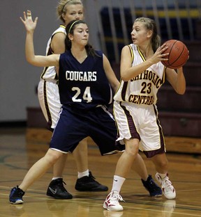 Cardinal Carter's  Aleesia Zonta, left, guards Catholic Central's Sam Brosseauin WECSSAA girls basketball action Tuesday October 2, 2012. The Comets won 45-27. (NICK BRANCACCIO/The Windsor Star)