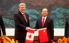 Prime Minister Stephen Harper shakes hands with Chinese Premier Wen Jiabao at the end of a signing ceremony on February 8, 2012 in Beijing, China. A $15.1-billion bid by China’s CNOOC for Canada’s oil producer Nexen Corp. should be blocked, says LaSalle's Angelo Iarusso.  (Photo by Diego Azubel-PoolGetty Images)