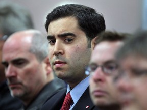 File photo of Coun. Al Maghnieh, centre, seated in the front row of the audience, listens to Integrity Commissioner Bruce P. Elman and other delegations during a report to city council for complaint under the code of conduct involving Maghnieh,  October 15, 2012. (NICK BRANCACCIO/The Windsor Star)