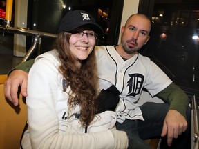 Adrienne Baginsk, left, and Ian Phillips comment on the game from seats on Transit Windsor following Detroit Tigers American League Championship victory over the NY Yankees near Comerica Park Thursday October 18, 2012. (NICK BRANCACCIO/The Windsor Star)