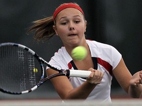 Samantha Zekelman from Academy Ste. Cecile hits a volley during the WECSSAA tennis championships at Parkside Tennis Club last week.  (TYLER BROWNBRIDGE/The Windsor Star)