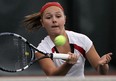 Samantha Zekelman from Academy Ste. Cecile hits a volley during the WECSSAA tennis championships at Parkside Tennis Club last week.  (TYLER BROWNBRIDGE/The Windsor Star)