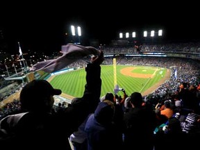 Detroit Tigers fans cheer at Comerica Park in Detroit, Michigan in this 2012 file photo.  (Photo by Doug Pensinger/Getty Images)