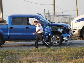 Scene of a serious motor vehicle crash at County Road 42 and the 8th Concession in Windsor, Ont. on October 4, 2012.  (JASON KRYK/ The Windsor Star)