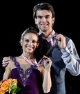 Pairs silver medalists Canada's Meagan Duhamel and Eric Radford show off their medals during victory ceremonies at Skate Canada International Saturday, October 27, 2012 in Windsor, Ont. (THE CANADIAN PRESS/Paul Chiasson)