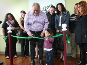 A waiting room at the Hotel-Dieu Grace Hospital was officially opened Tuesday, Oct. 2, 2012, in memory of Trevor Funkenhauser. His father Gunther Funkenhauser and niece Gabriella Funkenhauser helped cut the ceremonial ribbon. (DAN JANISSE/The Windsor Star)